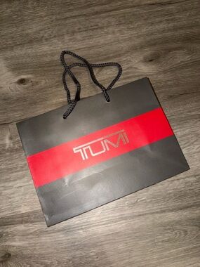 Tumi Black with Red Stripe Paper Shopping Bag